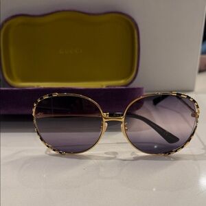 Gucci Gold and Black Women's Sunglasses with Purple Tint